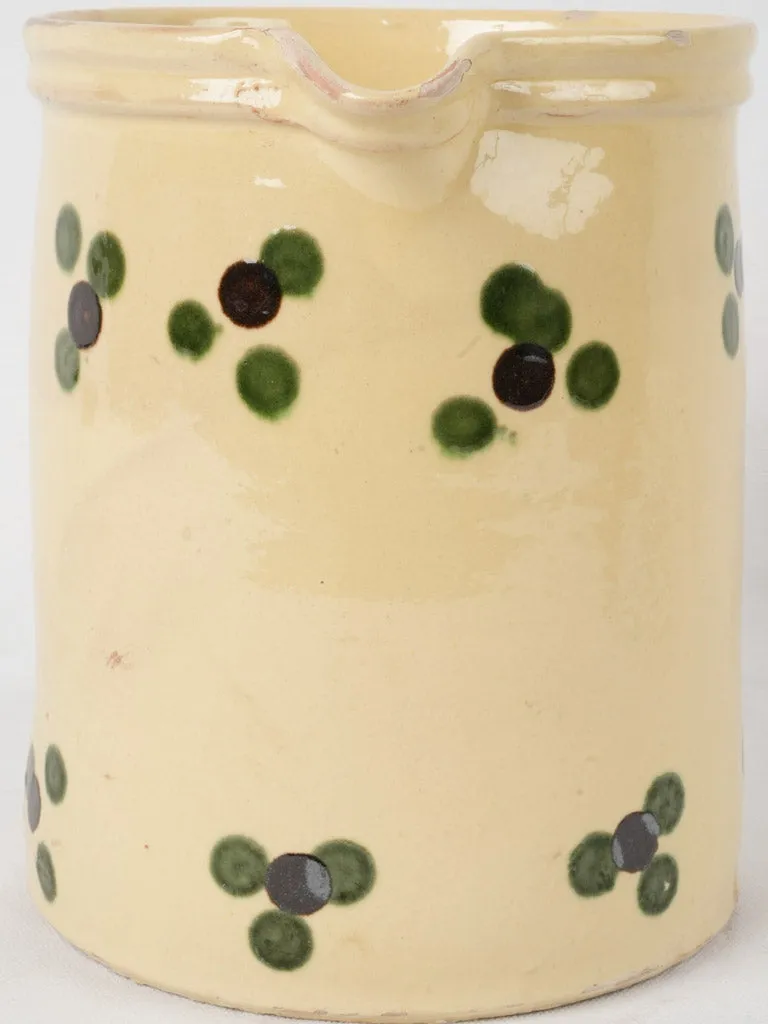 Antique French pitcher - yellow w/ spots 9½"